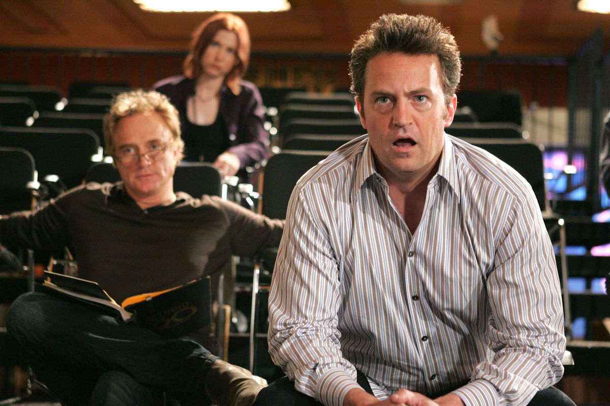 Matt Albie (Matthew Perry) looking aghast at something in front of him