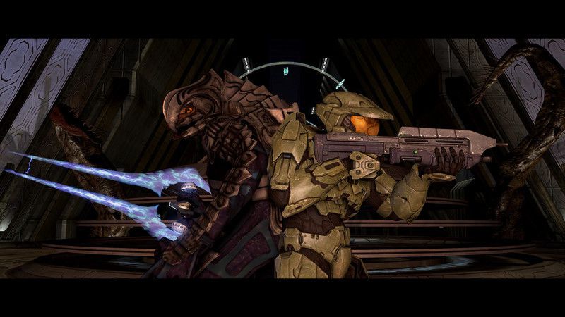 The Arbiter and Master Chief stand back-to-back, weapons in hand, in this screenshot from Halo 3