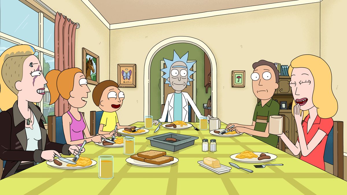 (L-R) Space Beth, Summer, Morty, Rick, Jerry, and Beth Smith sitting at a dinner table laughing and smiling in Rick and Morty.