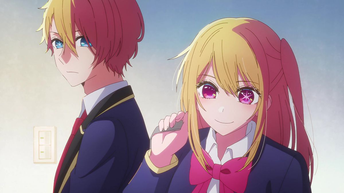 (L-R) A blue-eyed anime boy (Aquamarine Hoshino) and a red-eyed anime girl (Ruby Hoshino) dressed in high school attire in Oshi no Ko