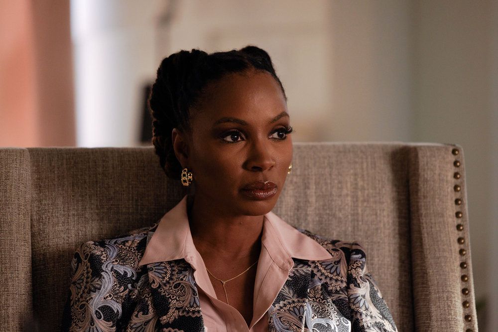 Shanola Hampton as Gabi Mosely in a close-up, sitting and looking steely