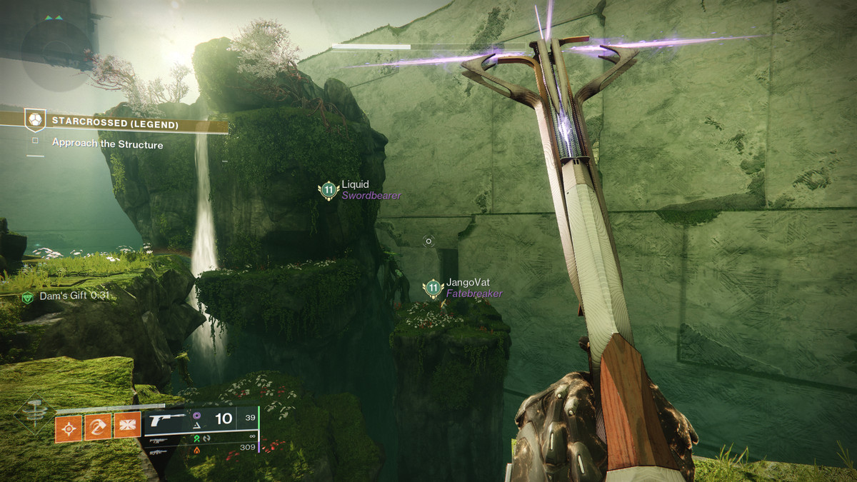 A Guardian climbs a rock in Destiny 2