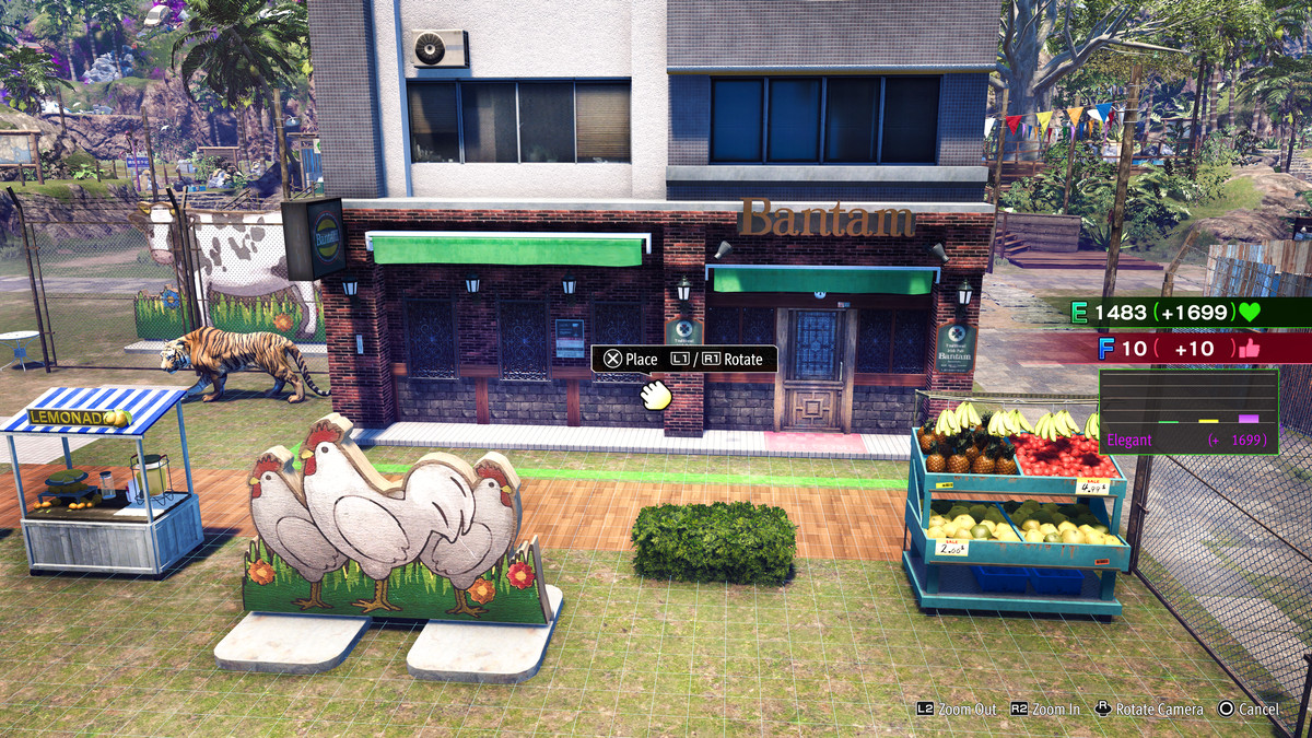 A player placing decorations, like a statue of chickens, a fruit stand, and a giant building, in Like a Dragon: Infinite Wealth’s Dondoko Island mode
