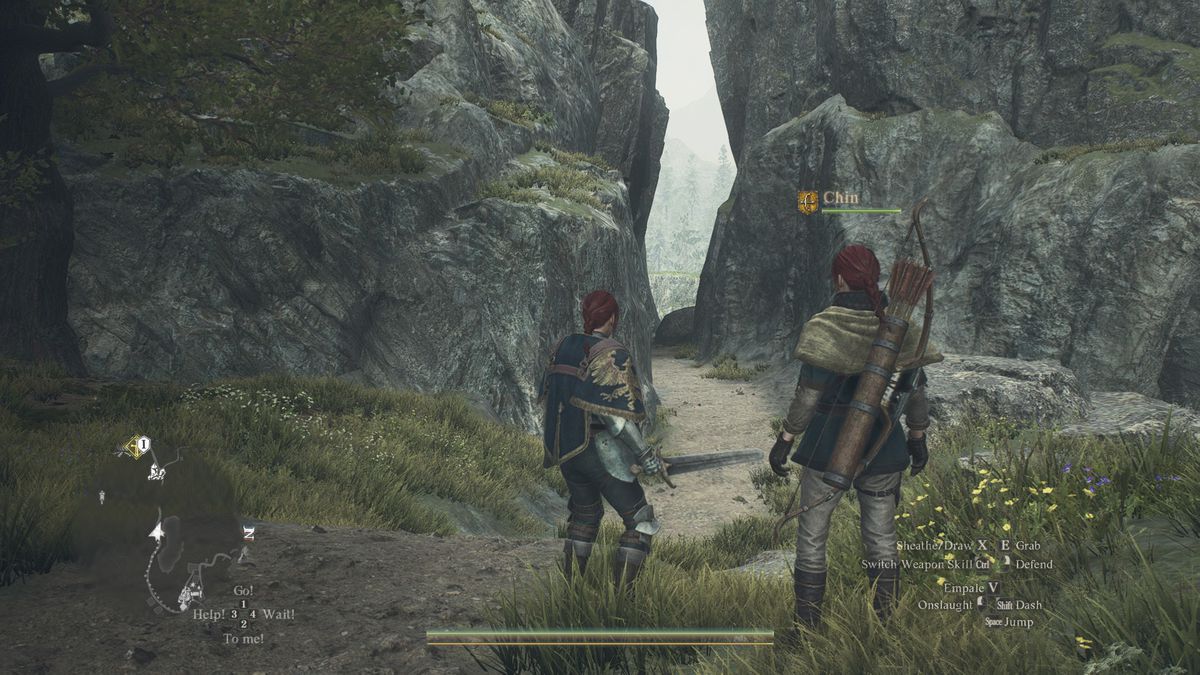 A human stands by the open path to the Nameless Village in Dragon’s Dogma 2.