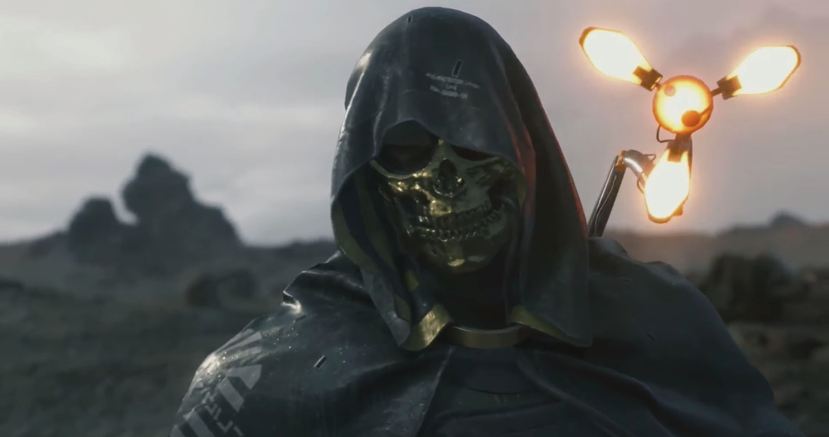 A man in a golden skull mask prepares to conjure a monster in Kojima Production’s Death Stranding