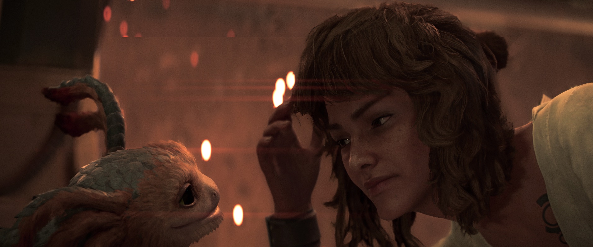 Kay and Nix look at each other on a dimly lit ship in Star Wars Outlaws