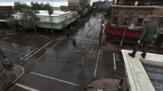 James looks from a rooftop at Silent Hill's streets with the fog modded away