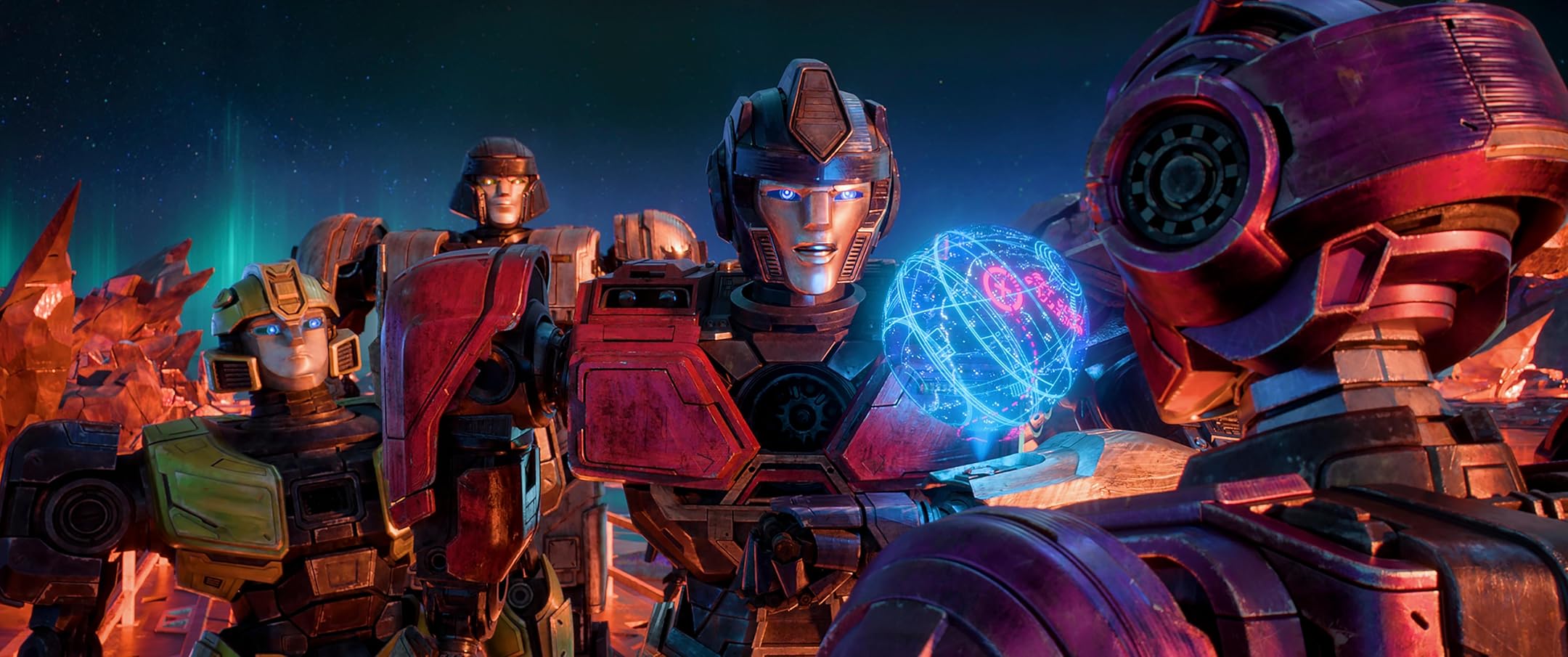 B-127, D-16, Orion Pax, and Elita-1 contemplate a map of Cybertron in a still from Transformers One