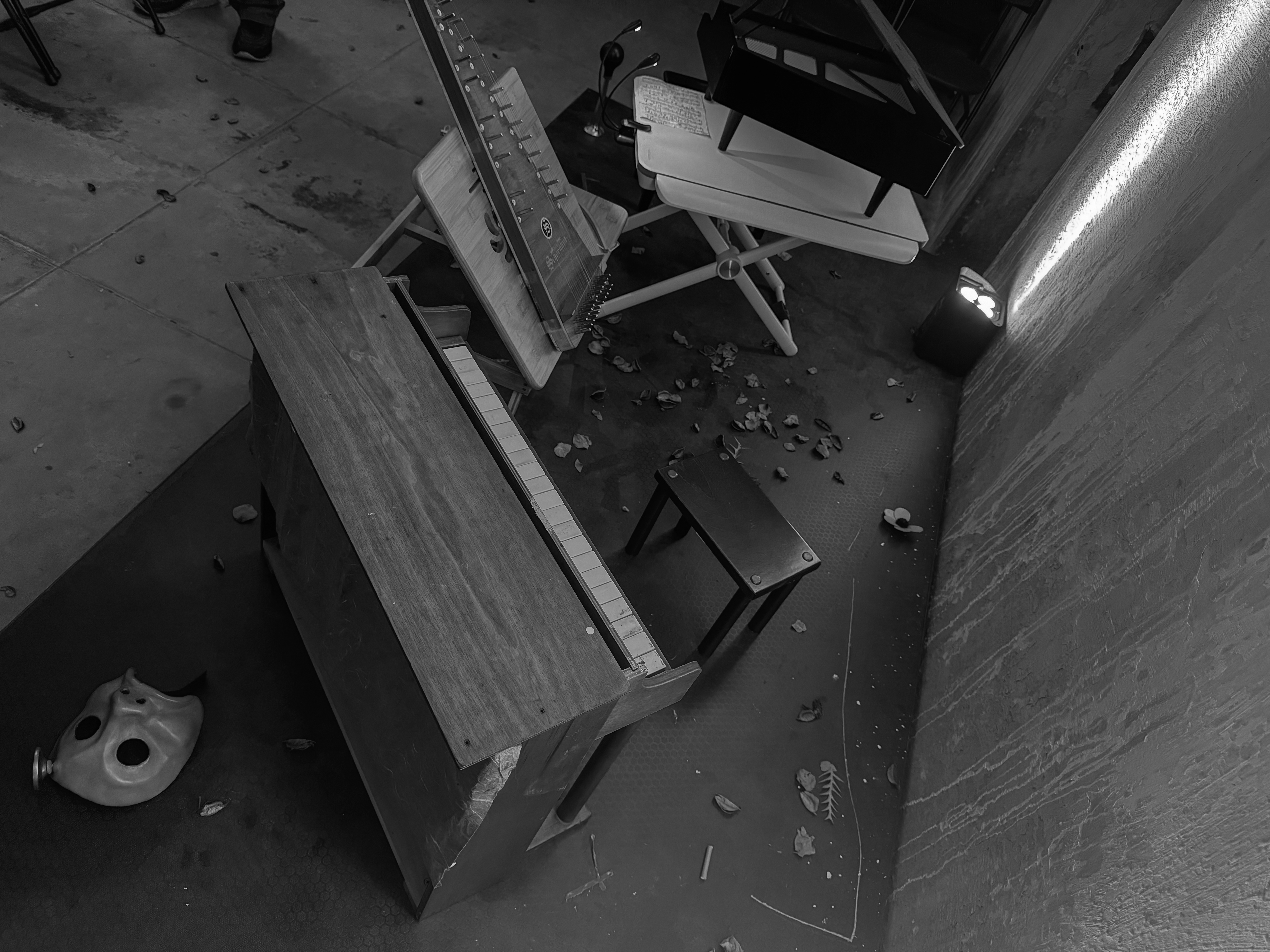 An overhead view of various instruments, including toy pianos, from the October 3, 2024 performance of Curios in the Catacombs by Margaret Leng Tan at Green-Wood Cemetery in New York