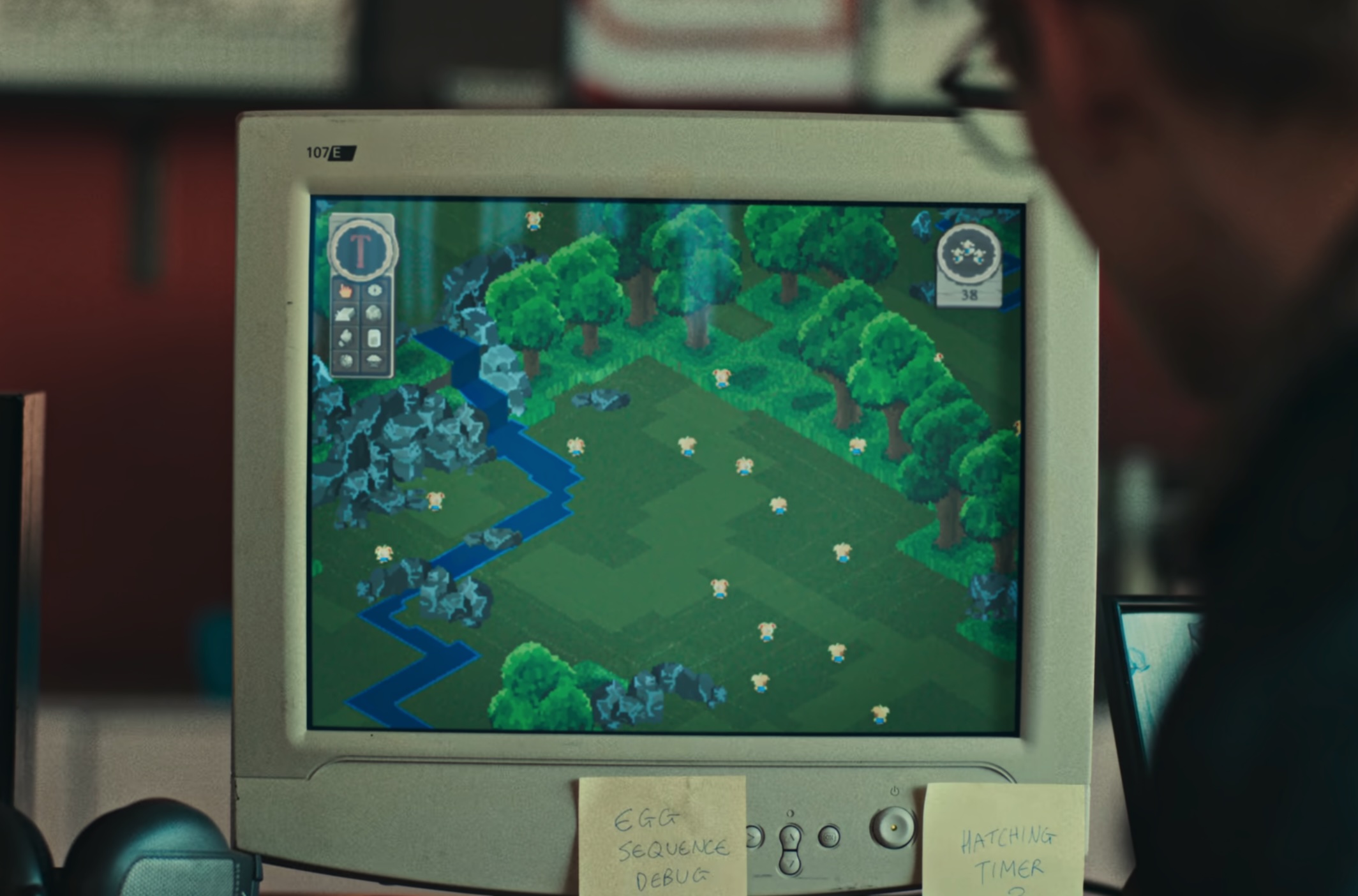 An old 1990s computer displaying Thronglets in Black MIrror