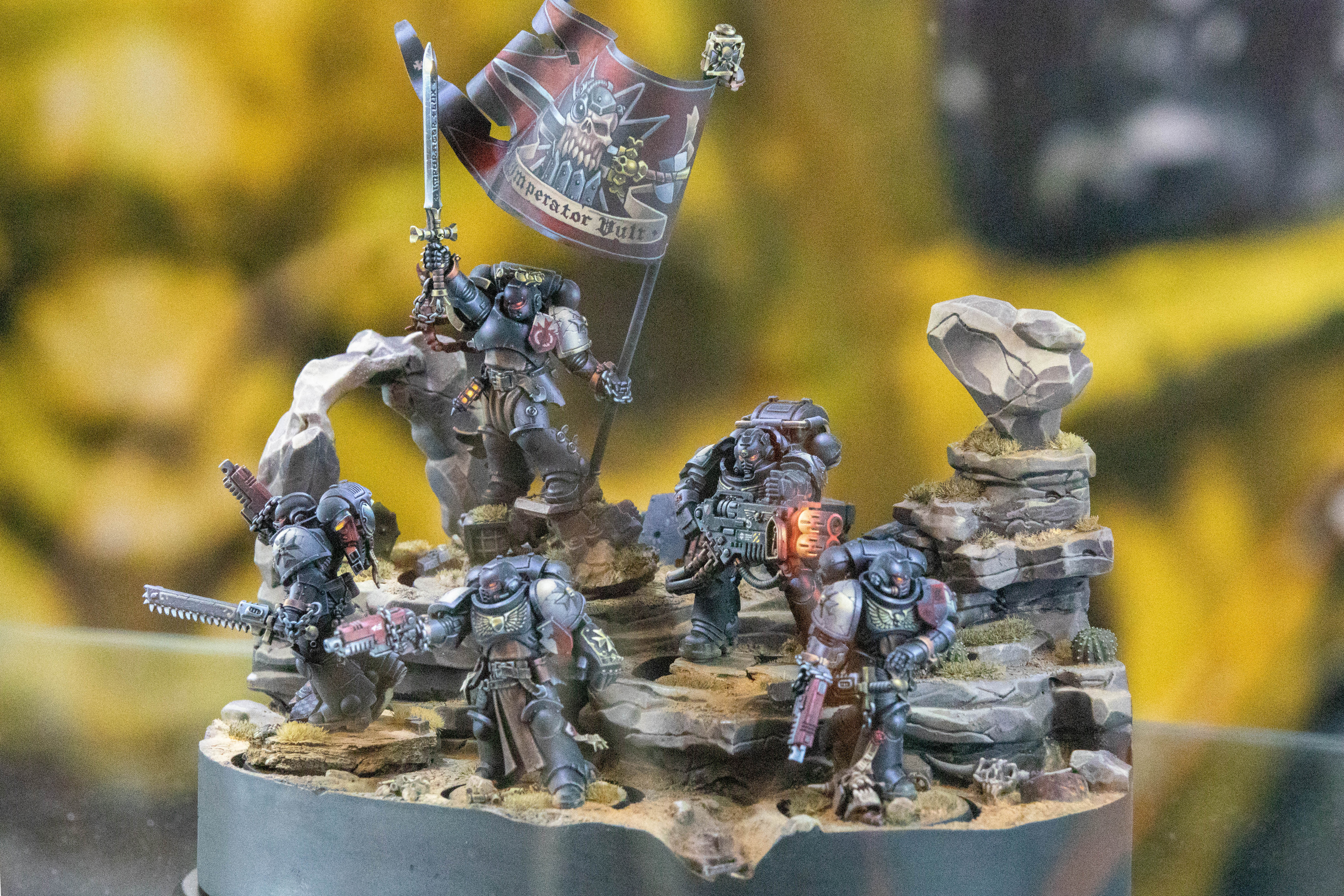 A model of a Warhammer 40K Space Marine fireteam