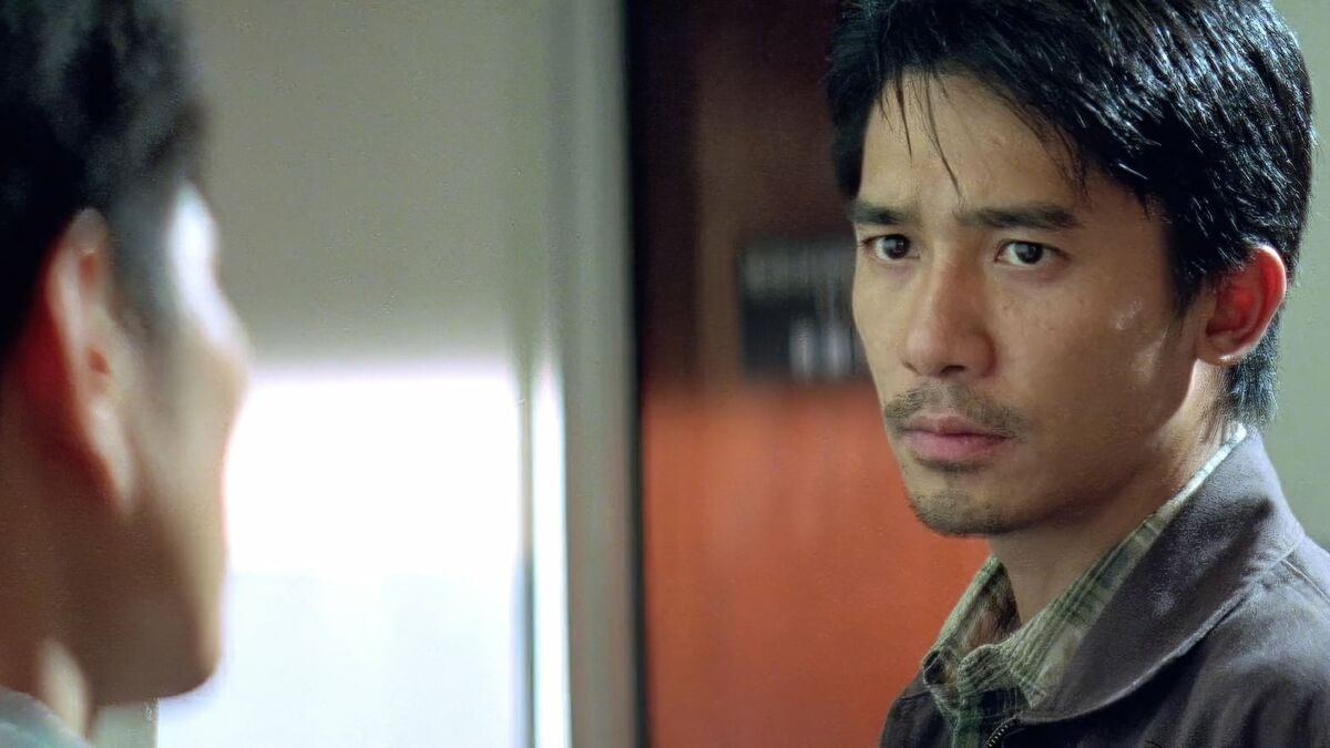 A very tired looked Tony Leung with a gotee in THe Longest Nite