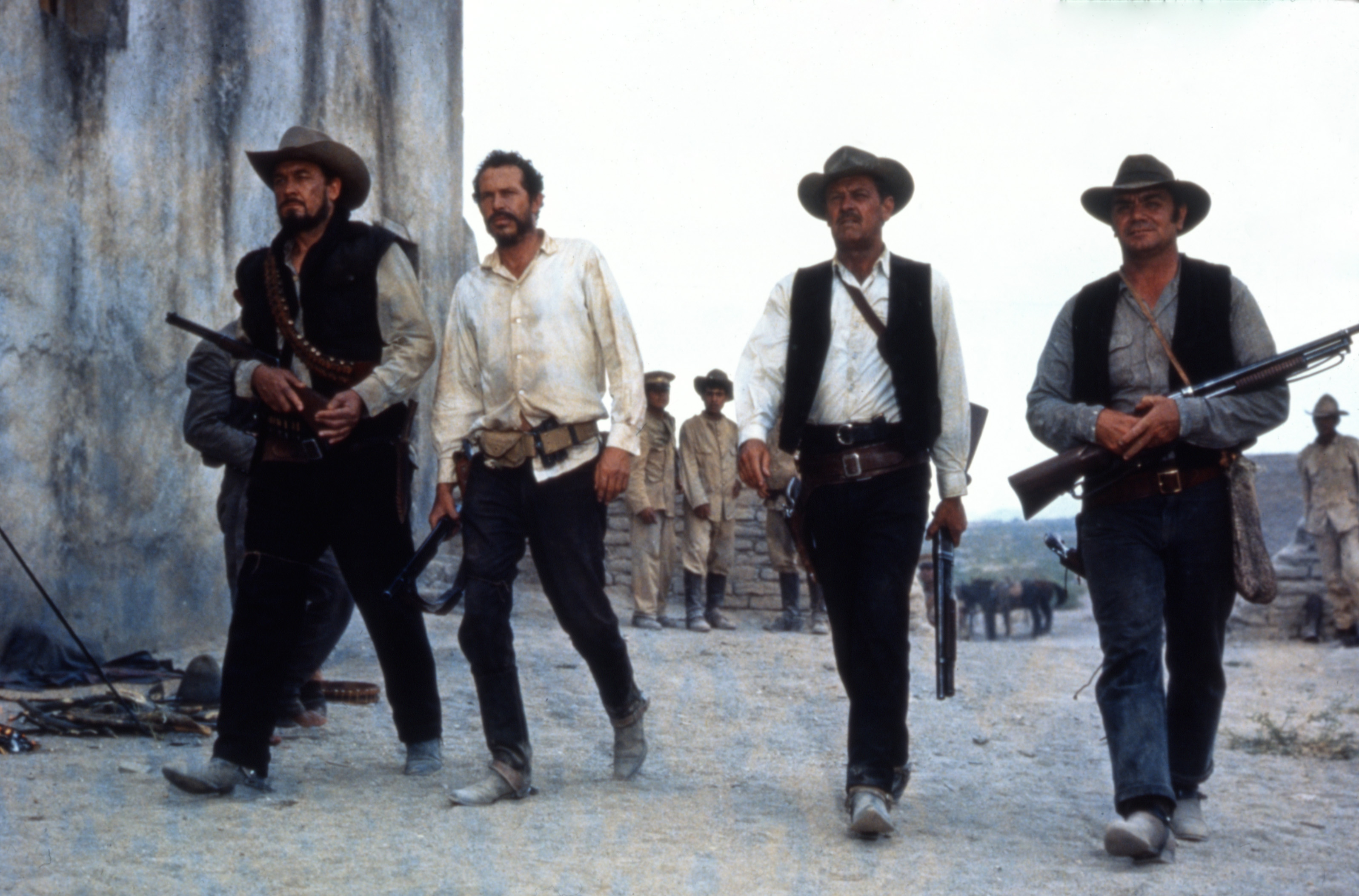 Ben Johnson, Warren Oates, William Holden, and Ernest Borgnine strut forward in The Wild Bunch