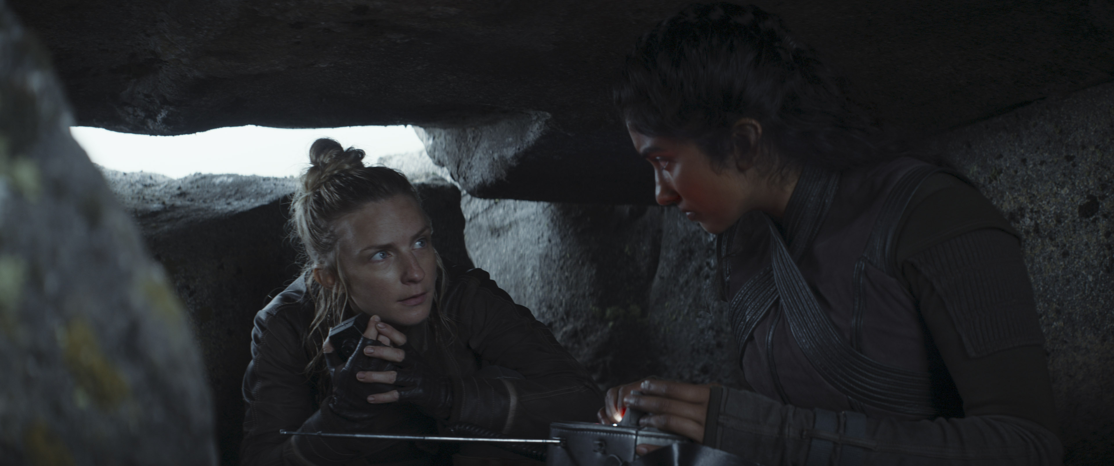 Vel and Cinta conferring in a still from Andor season 1