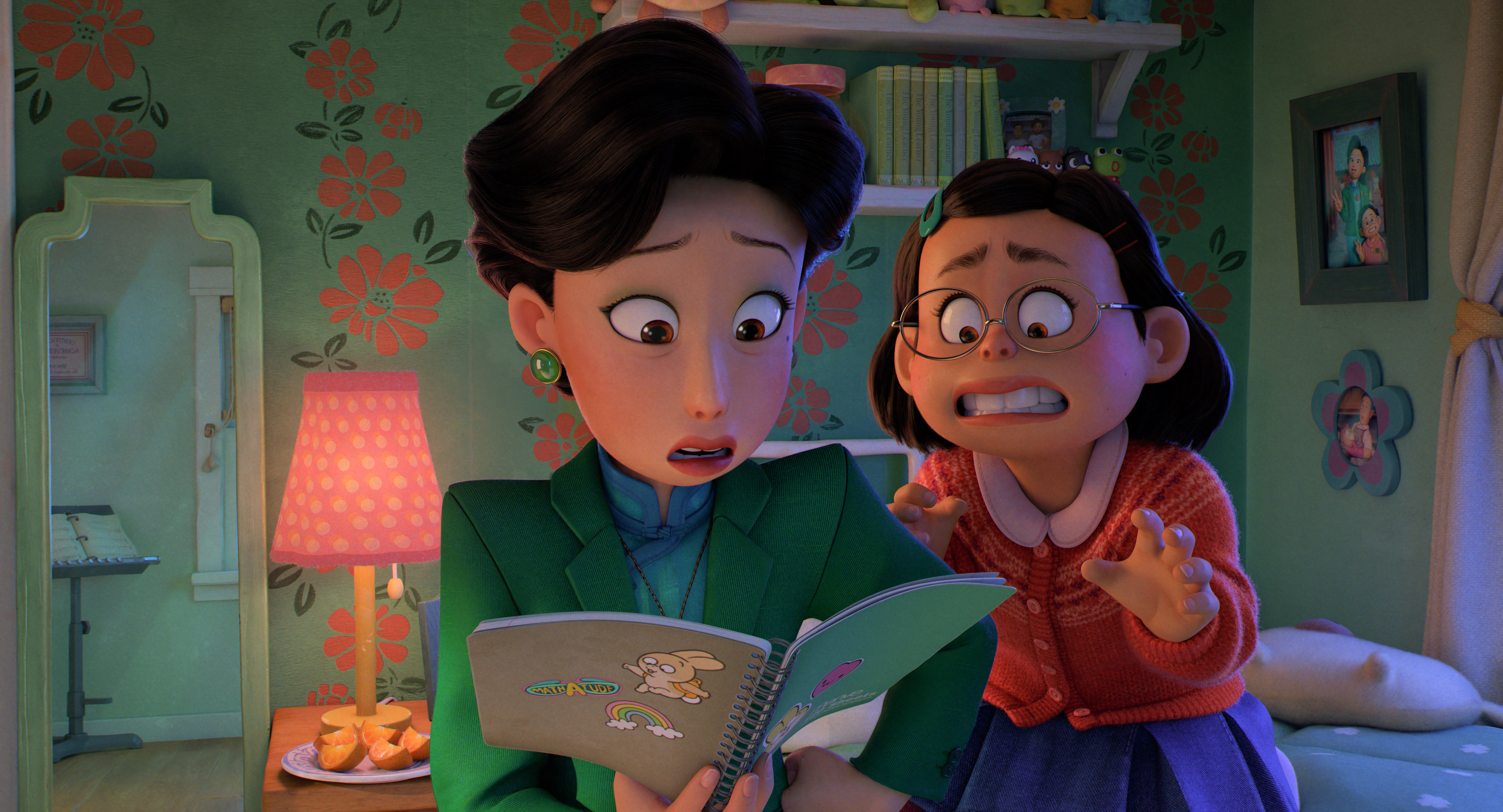 mei embarrassed as her mom leafs through her journal