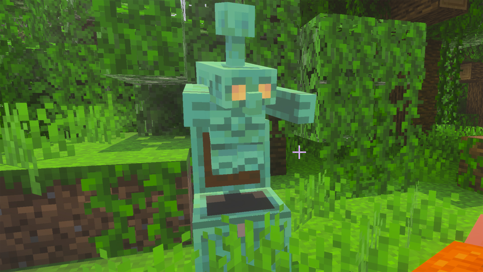 An oxidized copper golem in Minecraft.