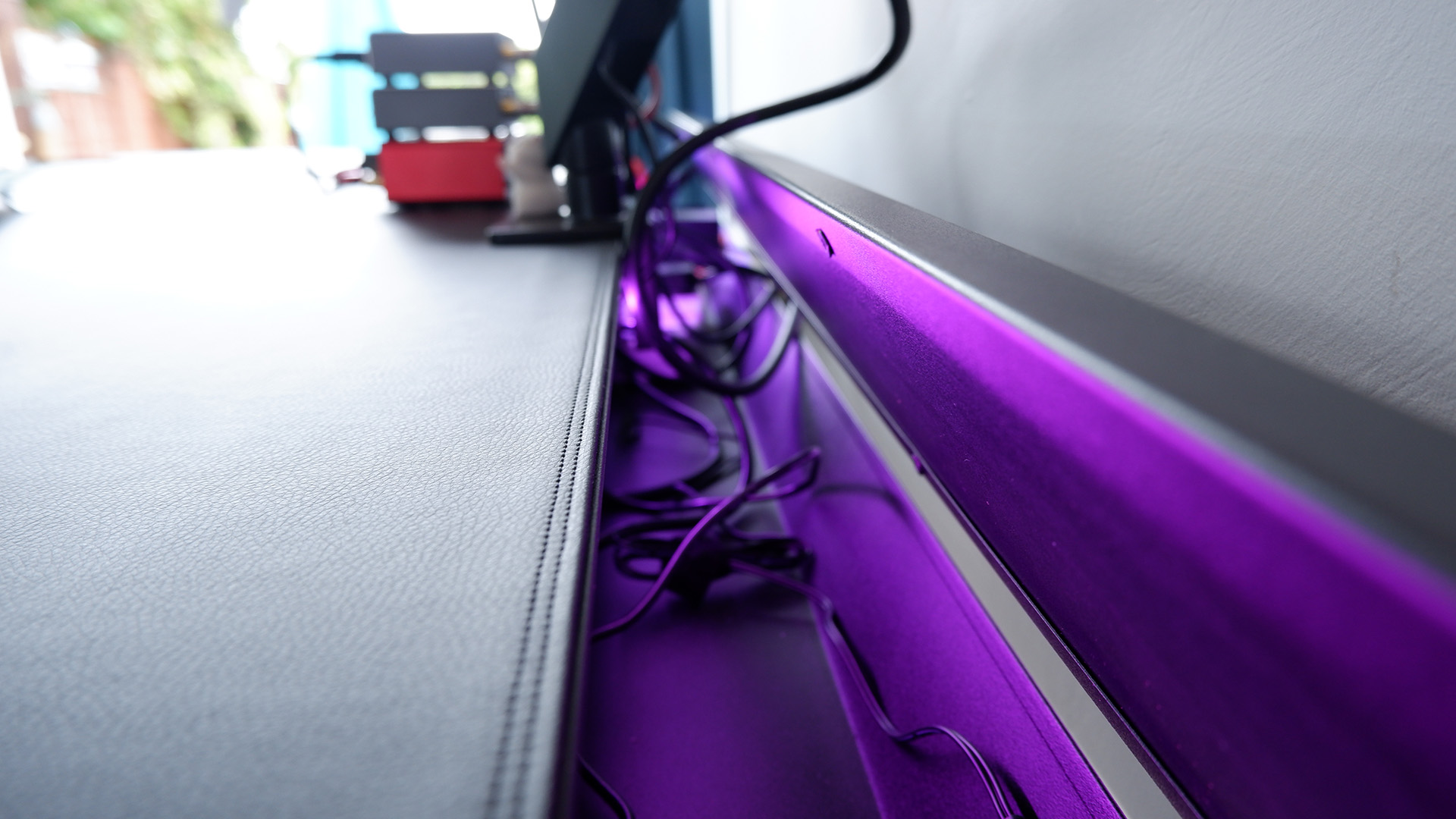 Secretlab Magnus Pro XL's cable storage behind a hinged panel.